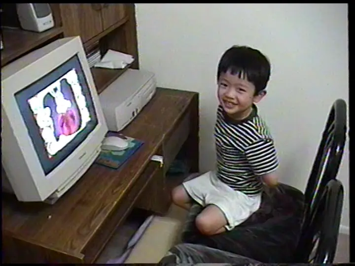 baby jimmy in front of windows 95 computer